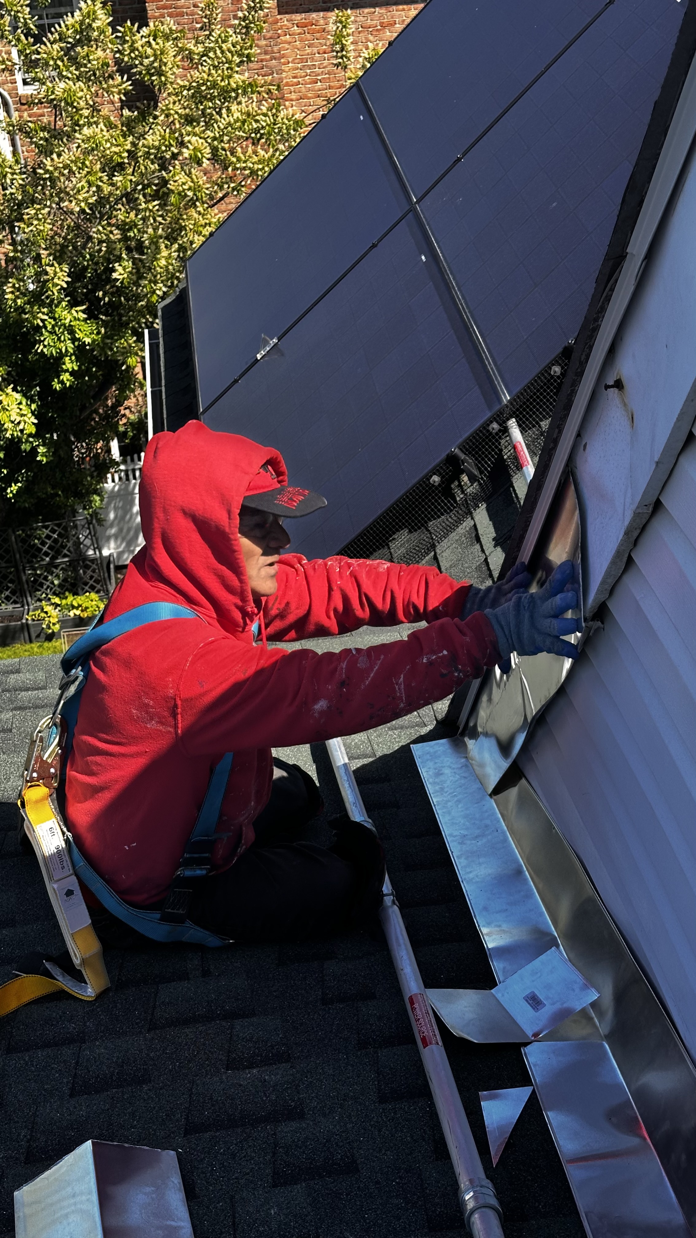 Solar panel and flashing installation on residential roof